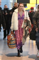 MILEY CYRUS Arrives at JFK Airport in New York 01/18/2016