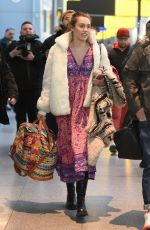 MILEY CYRUS Arrives at JFK Airport in New York 01/18/2016