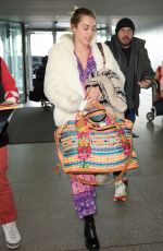 MILEY CYRUS Arrives at JFK Airport in New York 01/18/2016