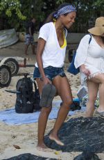 NAOMIE HARRIS in Cutoff Denim on the Beach in Barbados 01/01/2016