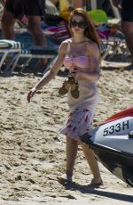 NICOLA ROBERTS in Bikini Top at a Beach in Barbados 01/19/2016