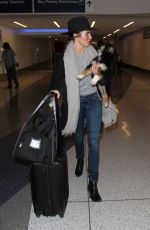 NIKKI REED at LAX Airport in Los Angeles 01/14/2016