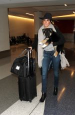 NIKKI REED at LAX Airport in Los Angeles 01/14/2016