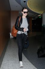 OLIVIA WILDE Arrives at LAX Airport in Los Angeles 01/27/2016