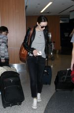 OLIVIA WILDE Arrives at LAX Airport in Los Angeles 01/27/2016