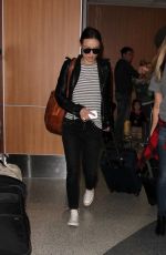 OLIVIA WILDE Arrives at LAX Airport in Los Angeles 01/27/2016