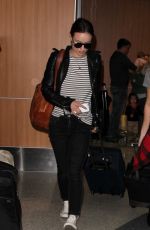 OLIVIA WILDE Arrives at LAX Airport in Los Angeles 01/27/2016