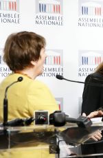 PAMELA ANDERSON at a Press Conference in Paris 01/19/2016