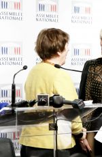 PAMELA ANDERSON at a Press Conference in Paris 01/19/2016