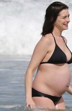 Pregnant ANNE HATHAWAY in Bikini at a Beach in Hawaii 01/03/2016