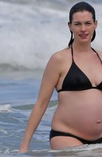 Pregnant ANNE HATHAWAY in Bikini at a Beach in Hawaii 01/03/2016
