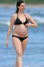 Pregnant ANNE HATHAWAY in Bikini at a Beach in Hawaii 01/03/2016