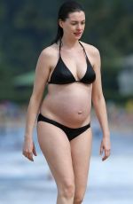 Pregnant ANNE HATHAWAY in Bikini at a Beach in Hawaii 01/03/2016