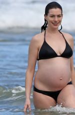 Pregnant ANNE HATHAWAY in Bikini at a Beach in Hawaii 01/03/2016