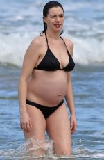 Pregnant ANNE HATHAWAY in Bikini at a Beach in Hawaii 01/03/2016