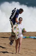 Pregnant ANNE HATHAWAY in Red Bikini on the Beach in Hawaii 01/04/2016