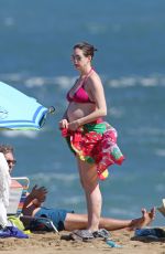 Pregnant ANNE HATHAWAY in Red Bikini on the Beach in Hawaii 01/04/2016