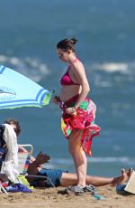 Pregnant ANNE HATHAWAY in Red Bikini on the Beach in Hawaii 01/04/2016