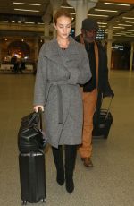 ROSIE HUNTINGTON-WHITELEY Arrives at Heathrow Airport in London 01/28/2016