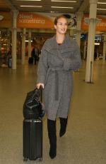 ROSIE HUNTINGTON-WHITELEY Arrives at Heathrow Airport in London 01/28/2016