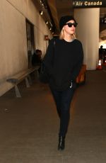 SARAH GADON at LAX Airport in Los Angeles 01/08/2016