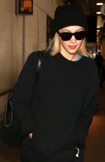 SARAH GADON at LAX Airport in Los Angeles 01/08/2016