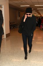 SARAH GADON at LAX Airport in Los Angeles 01/08/2016