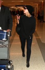 SARAH GADON at LAX Airport in Los Angeles 01/08/2016