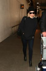 SARAH GADON at LAX Airport in Los Angeles 01/08/2016