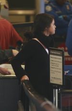 SELENA GOMEZ Boarding a Flight at LAX Airport 01/20/2016