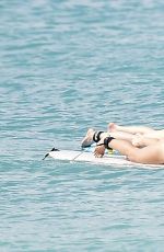 SUKI WATERHOUSE in Bikini Bottom Surfing in Barbados 01/04/2016