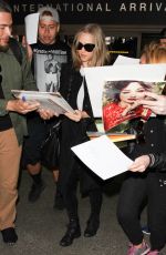 AMANDA SEYFRIED Arrives at Los Angeles International Airport 02/05/2016