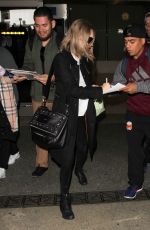 AMANDA SEYFRIED Arrives at Los Angeles International Airport 02/05/2016
