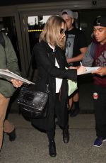 AMANDA SEYFRIED Arrives at Los Angeles International Airport 02/05/2016