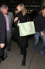 AMANDA SEYFRIED Arrives at Los Angeles International Airport 02/05/2016