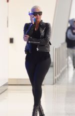 AMBER ROSE at JFK Airport in New York 02/02/2016