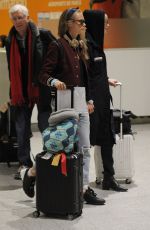 CARA DELEVINGNE and ANNIE CLARK at Charles-De-Gaulle Airport in Paris 02/28/2016