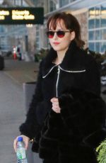 DAKOTA JOHNSON Arrives at Airport in Vancouver 02/15/2016