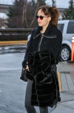 DAKOTA JOHNSON Arrives at Airport in Vancouver 02/15/2016
