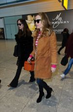 DAKOTA JOHNSON Arrives at Heathrow Airport in London 02/07/2016