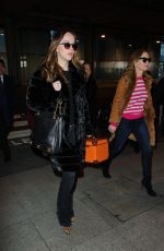 DAKOTA JOHNSON Arrives at Heathrow Airport in London 02/07/2016