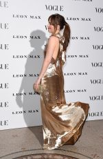 DAKOTA JOHNSON at Vogue 100: A Century of Style Exhibition in London 02/09/2016