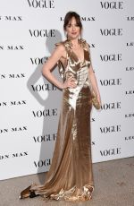 DAKOTA JOHNSON at Vogue 100: A Century of Style Exhibition in London 02/09/2016