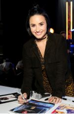 DEMI LOVAT at Charities Signings at mMusicares Person of the Year Honoring Lionel Richie in Los Angeles 02/12/2016
