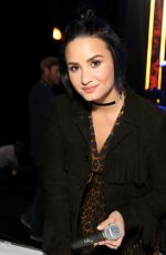 DEMI LOVAT at Charities Signings at mMusicares Person of the Year Honoring Lionel Richie in Los Angeles 02/12/2016