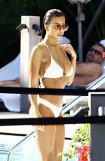 DEVIN BRUGMAN and NATASHA OAKLEY in Bikinis at a Pool in Miami 02/07/2016
