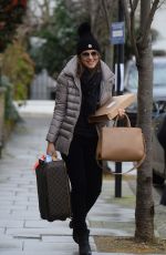 ELIZABETH HURLEY Leaves Her Home in London 01/29/2016
