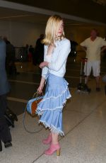 ELLE FANNING at Los Angeles International Airport 02/13/2016