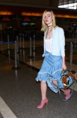 ELLE FANNING at Los Angeles International Airport 02/13/2016