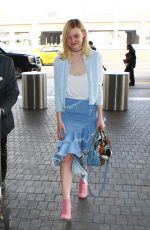 ELLE FANNING at Los Angeles International Airport 02/13/2016